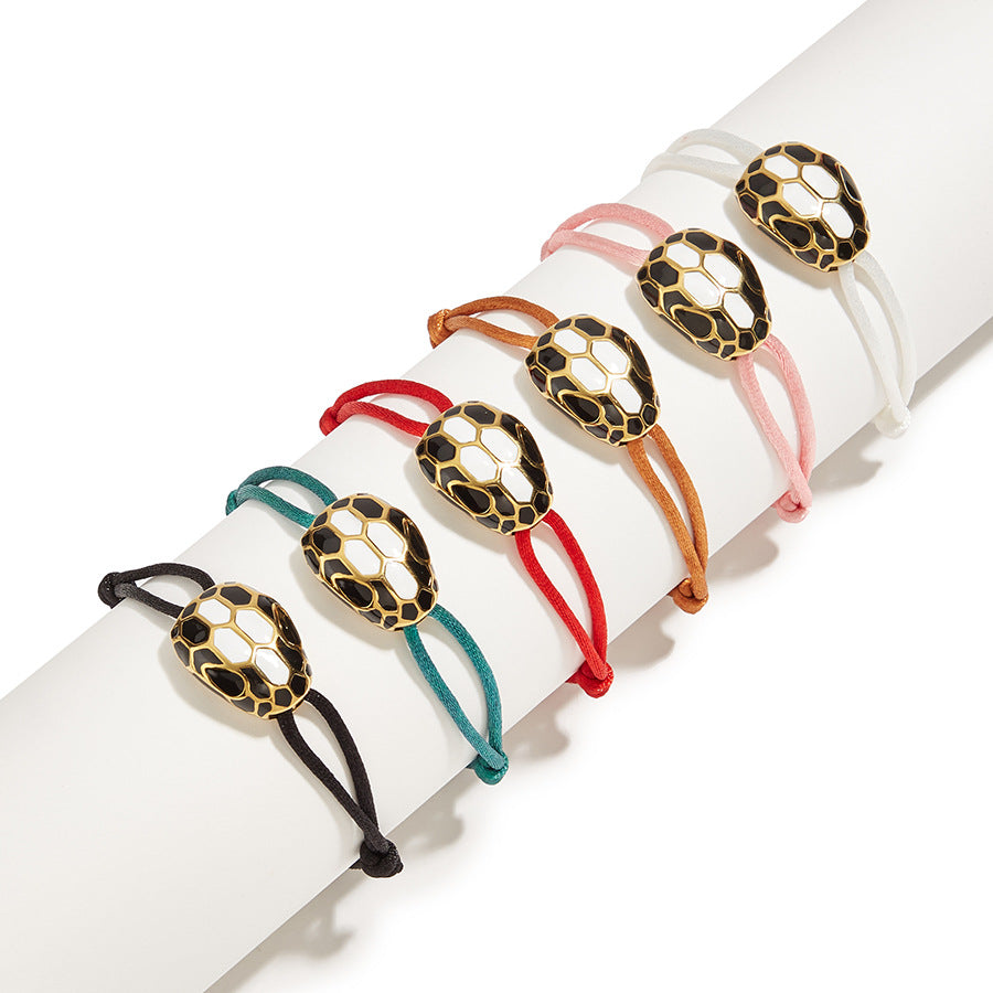 Bob Snake Cobra Rope Bracelet in Black & White Enamel And Gold Tone — real photo 2